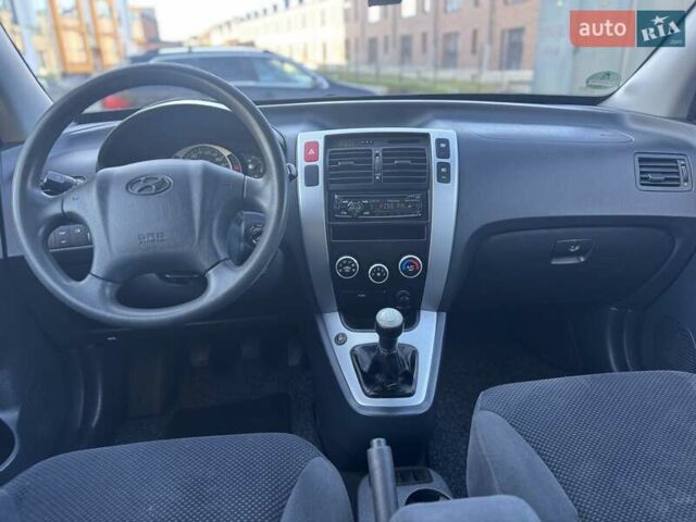 Синий Хендай Туксон, объемом двигателя 1.98 л и пробегом 178 тыс. км за 8700 $, фото 29 на Automoto.ua