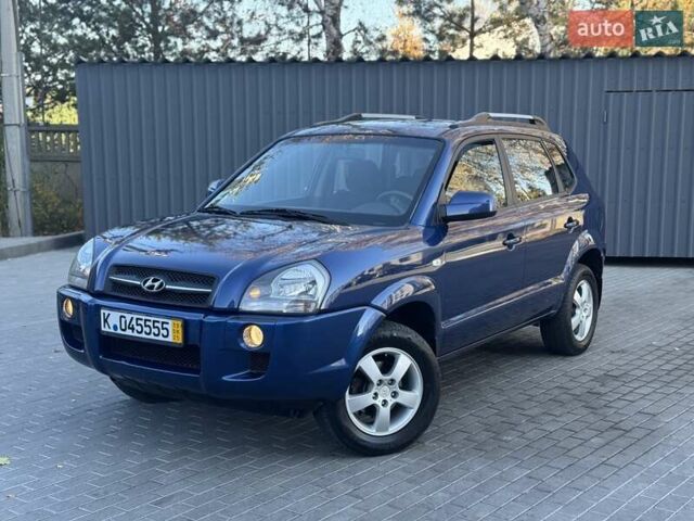Синий Хендай Туксон, объемом двигателя 1.98 л и пробегом 178 тыс. км за 8700 $, фото 2 на Automoto.ua
