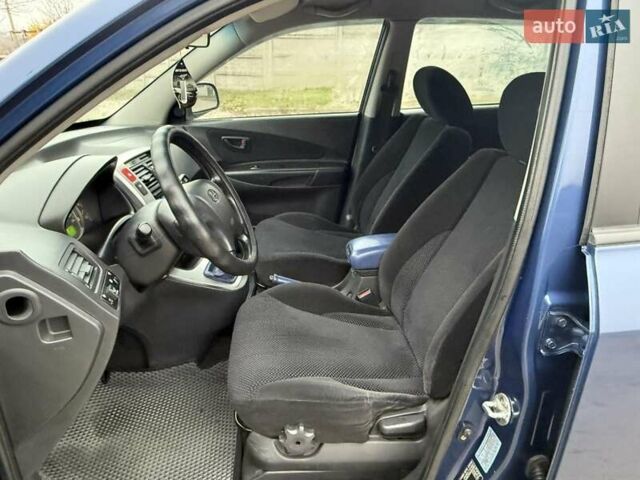 Синий Хендай Туксон, объемом двигателя 2 л и пробегом 270 тыс. км за 6250 $, фото 9 на Automoto.ua