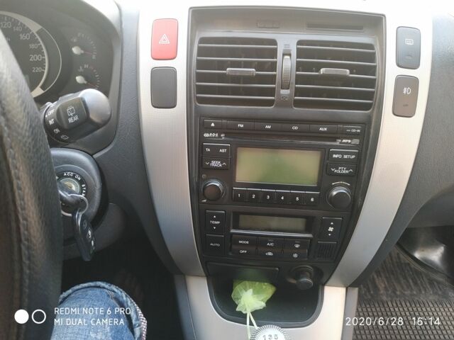 Синий Хендай Туксон, объемом двигателя 2 л и пробегом 200 тыс. км за 8000 $, фото 10 на Automoto.ua