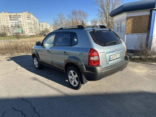 Синий Хендай Туксон, объемом двигателя 2 л и пробегом 187 тыс. км за 8200 $, фото 2 на Automoto.ua