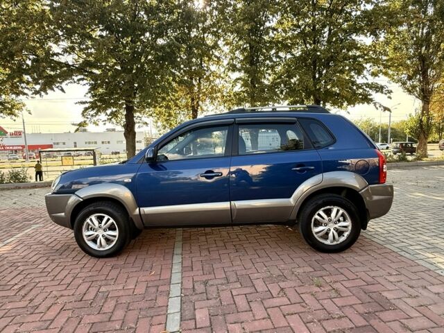 Синий Хендай Туксон, объемом двигателя 2 л и пробегом 168 тыс. км за 7500 $, фото 4 на Automoto.ua