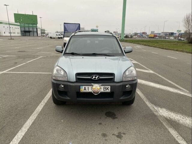 Синий Хендай Туксон, объемом двигателя 2 л и пробегом 179 тыс. км за 6500 $, фото 3 на Automoto.ua