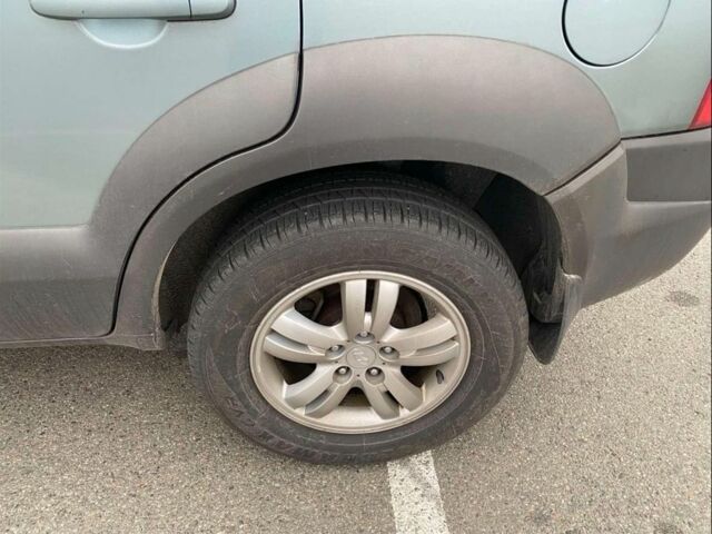 Синий Хендай Туксон, объемом двигателя 2 л и пробегом 179 тыс. км за 6500 $, фото 5 на Automoto.ua