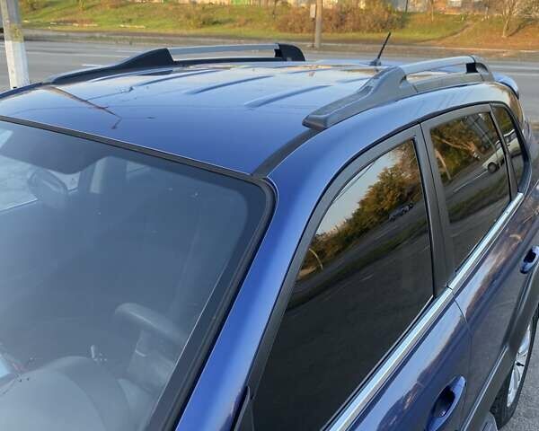 Хендай Туксон 2010 в Харькове на Automoto.ua Синий Хендай Туксон, объемом двигателя 1.98 л и пробегом 192 тыс. км за 9400 $, фото 13 на Automoto.ua