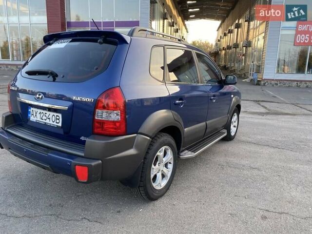 Хендай Туксон 2010 в Харькове на Automoto.ua Синий Хендай Туксон, объемом двигателя 1.98 л и пробегом 192 тыс. км за 9400 $, фото 4 на Automoto.ua