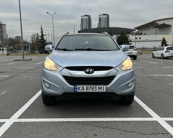 Синий Хендай Туксон, объемом двигателя 2.36 л и пробегом 286 тыс. км за 9800 $, фото 1 на Automoto.ua