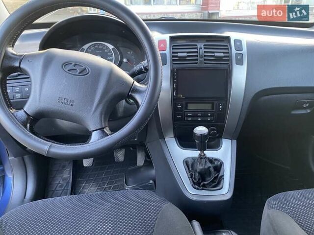 Хендай Туксон 2010 в Харькове на Automoto.ua Синий Хендай Туксон, объемом двигателя 1.98 л и пробегом 192 тыс. км за 9400 $, фото 11 на Automoto.ua