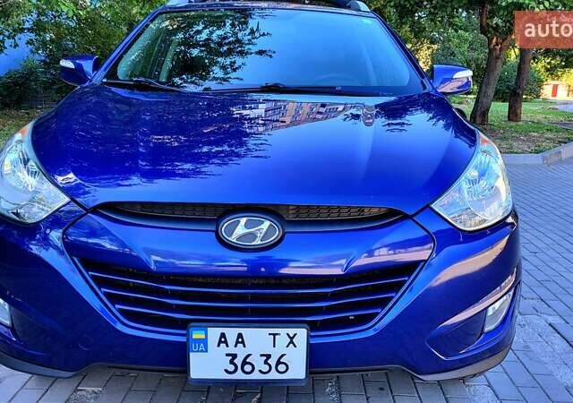 Синий Хендай Туксон, объемом двигателя 2.4 л и пробегом 113 тыс. км за 9600 $, фото 10 на Automoto.ua