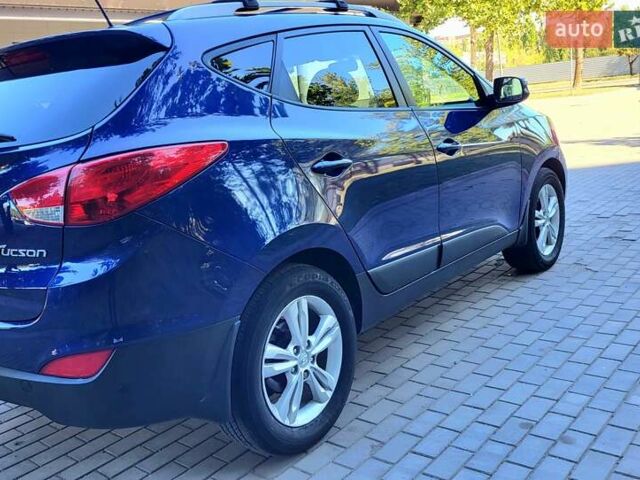 Хендай Туксон 2012 у Кривому Розі на Automoto.ua Синій Хендай Туксон, об'ємом двигуна 2.4 л та пробігом 114 тис. км за 10600 $, фото 4 на Automoto.ua