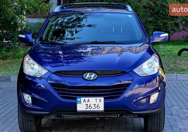 Синий Хендай Туксон, объемом двигателя 2.4 л и пробегом 113 тыс. км за 9600 $, фото 24 на Automoto.ua
