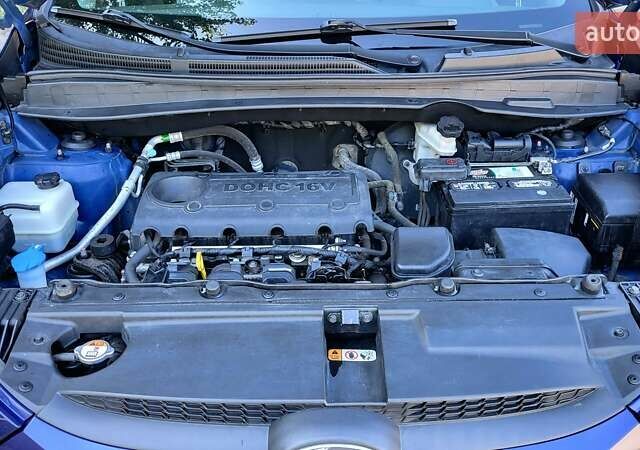 Синий Хендай Туксон, объемом двигателя 2.4 л и пробегом 113 тыс. км за 9600 $, фото 7 на Automoto.ua