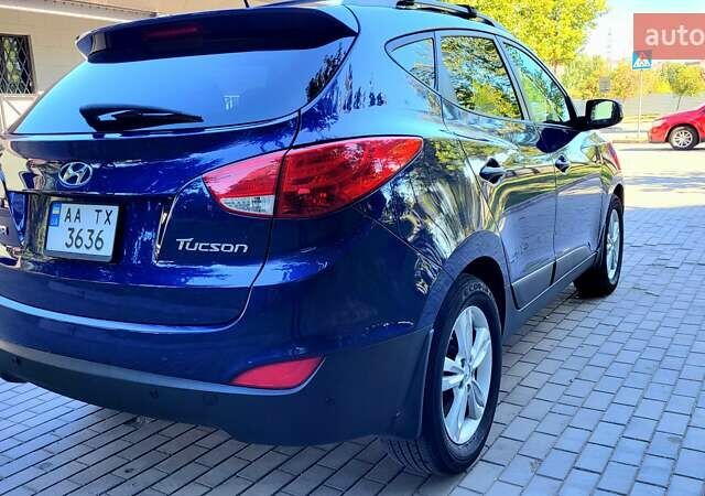 Синий Хендай Туксон, объемом двигателя 2.4 л и пробегом 113 тыс. км за 9600 $, фото 25 на Automoto.ua