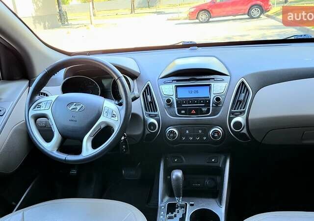 Хендай Туксон 2012 у Кривому Розі на Automoto.ua Синій Хендай Туксон, об'ємом двигуна 2.4 л та пробігом 114 тис. км за 10600 $, фото 16 на Automoto.ua