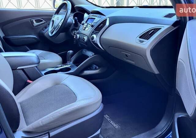 Синий Хендай Туксон, объемом двигателя 2.4 л и пробегом 113 тыс. км за 9600 $, фото 20 на Automoto.ua