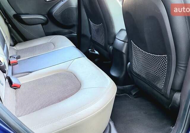 Синий Хендай Туксон, объемом двигателя 2.4 л и пробегом 113 тыс. км за 9600 $, фото 21 на Automoto.ua