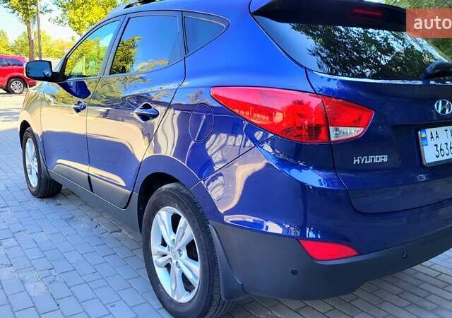 Синий Хендай Туксон, объемом двигателя 2.4 л и пробегом 113 тыс. км за 9600 $, фото 26 на Automoto.ua