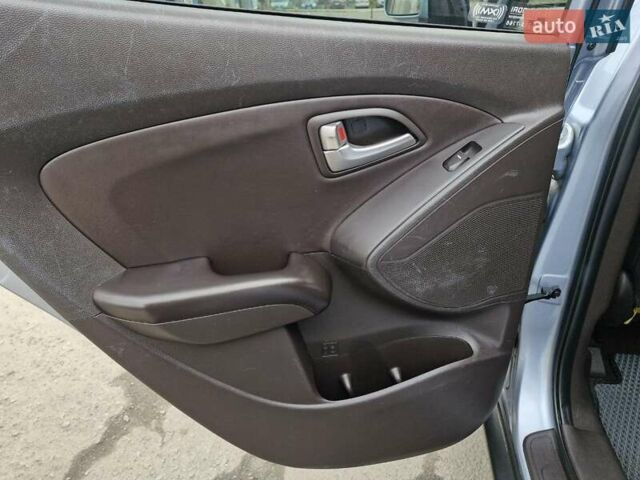 Синий Хендай Туксон, объемом двигателя 2.4 л и пробегом 244 тыс. км за 12599 $, фото 22 на Automoto.ua