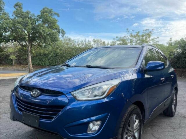 Синий Хендай Туксон, объемом двигателя 2.4 л и пробегом 76 тыс. км за 9600 $, фото 2 на Automoto.ua