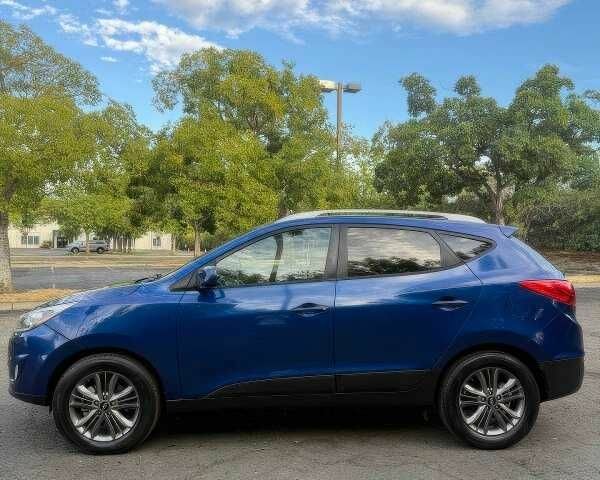 Синий Хендай Туксон, объемом двигателя 2.4 л и пробегом 110 тыс. км за 3000 $, фото 3 на Automoto.ua