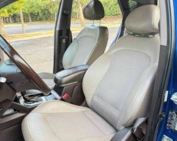 Синий Хендай Туксон, объемом двигателя 2.4 л и пробегом 110 тыс. км за 3000 $, фото 8 на Automoto.ua