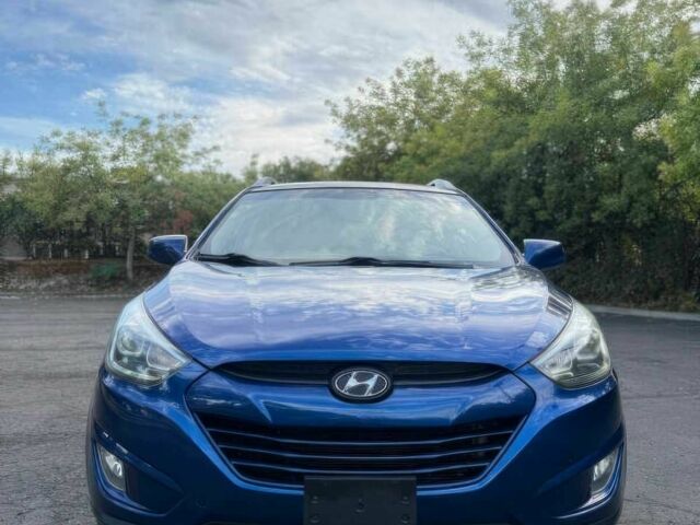 Синий Хендай Туксон, объемом двигателя 2.4 л и пробегом 76 тыс. км за 9600 $, фото 1 на Automoto.ua