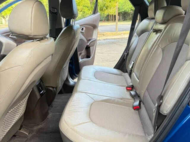 Синий Хендай Туксон, объемом двигателя 2.4 л и пробегом 76 тыс. км за 9600 $, фото 11 на Automoto.ua