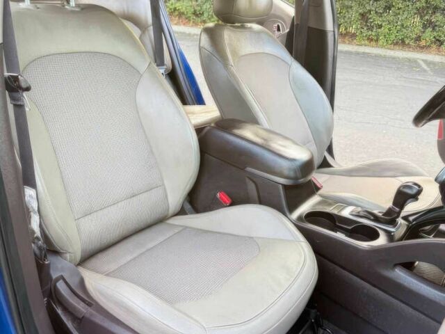 Синий Хендай Туксон, объемом двигателя 2.4 л и пробегом 76 тыс. км за 9600 $, фото 9 на Automoto.ua