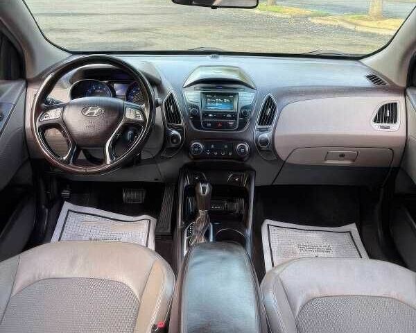 Синий Хендай Туксон, объемом двигателя 2.4 л и пробегом 110 тыс. км за 3000 $, фото 13 на Automoto.ua