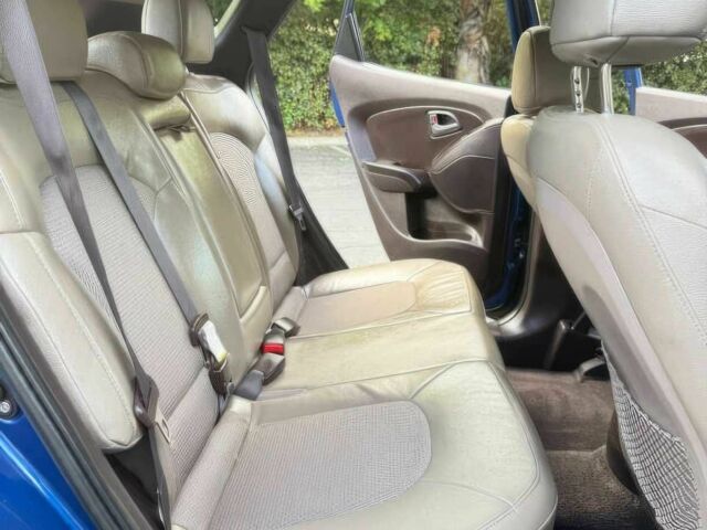 Синий Хендай Туксон, объемом двигателя 2.4 л и пробегом 76 тыс. км за 9600 $, фото 10 на Automoto.ua