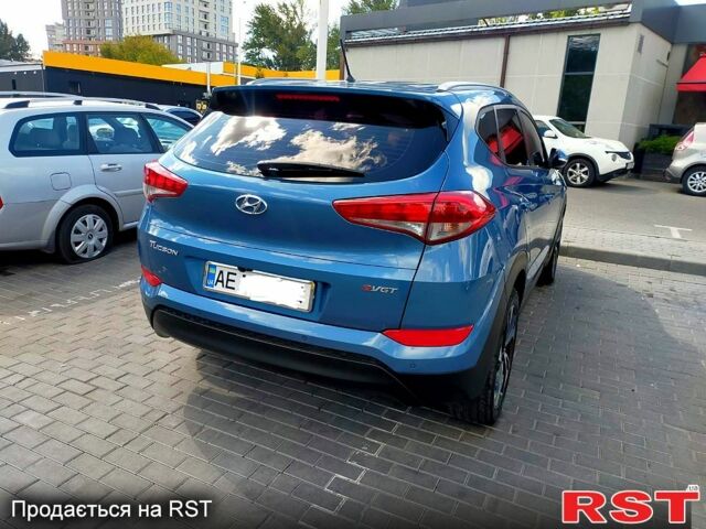 Синий Хендай Туксон, объемом двигателя 2 л и пробегом 198 тыс. км за 15700 $, фото 6 на Automoto.ua