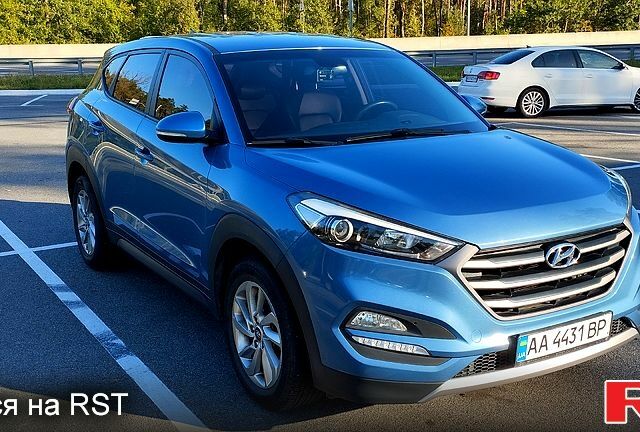 Синий Хендай Туксон, объемом двигателя 2 л и пробегом 112 тыс. км за 17200 $, фото 1 на Automoto.ua