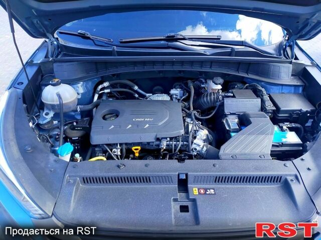 Синий Хендай Туксон, объемом двигателя 2 л и пробегом 198 тыс. км за 15700 $, фото 5 на Automoto.ua