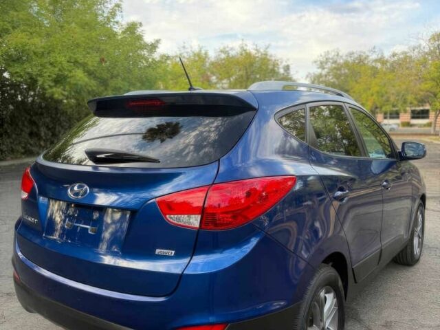 Синий Хендай Туксон, объемом двигателя 2.4 л и пробегом 76 тыс. км за 9600 $, фото 7 на Automoto.ua