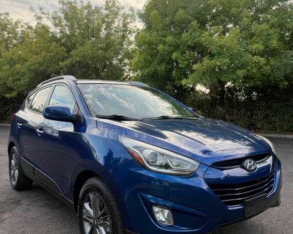 Синий Хендай Туксон, объемом двигателя 2.4 л и пробегом 110 тыс. км за 3000 $, фото 2 на Automoto.ua