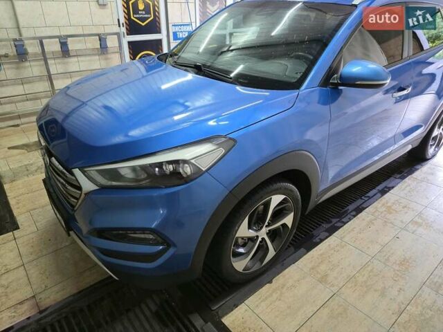 Синий Хендай Туксон, объемом двигателя 1.59 л и пробегом 136 тыс. км за 14300 $, фото 13 на Automoto.ua