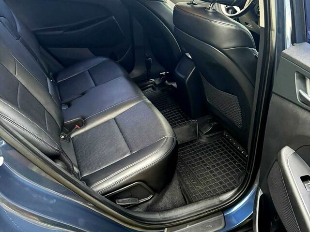 Синій Хендай Туксон, об'ємом двигуна 2 л та пробігом 86 тис. км за 18500 $, фото 9 на Automoto.ua