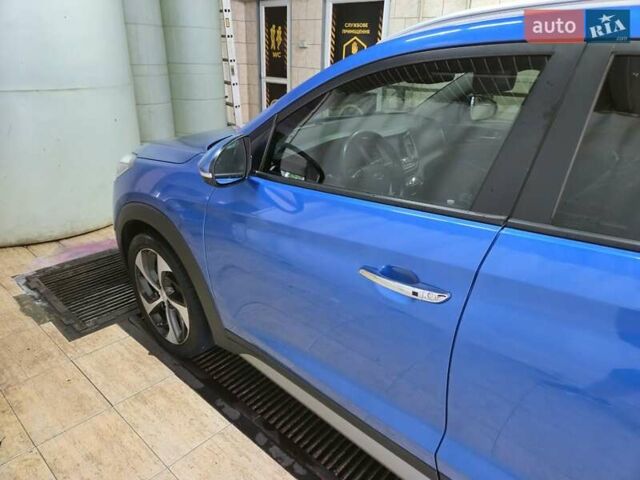 Синий Хендай Туксон, объемом двигателя 1.59 л и пробегом 136 тыс. км за 14300 $, фото 5 на Automoto.ua