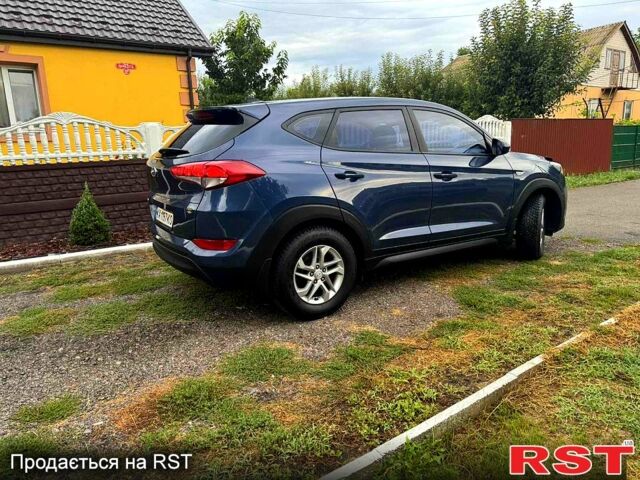 Синій Хендай Туксон, об'ємом двигуна 2 л та пробігом 86 тис. км за 18500 $, фото 4 на Automoto.ua