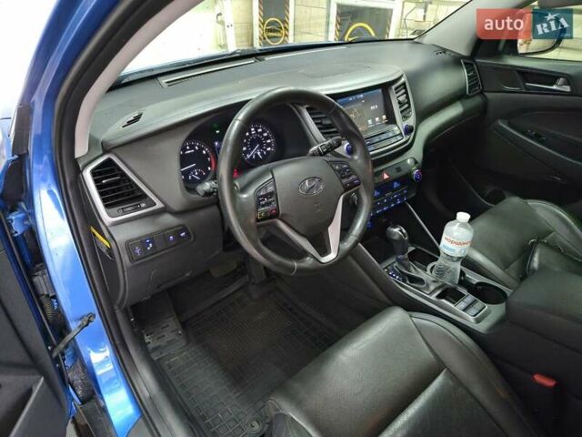 Синий Хендай Туксон, объемом двигателя 1.59 л и пробегом 125 тыс. км за 14800 $, фото 16 на Automoto.ua