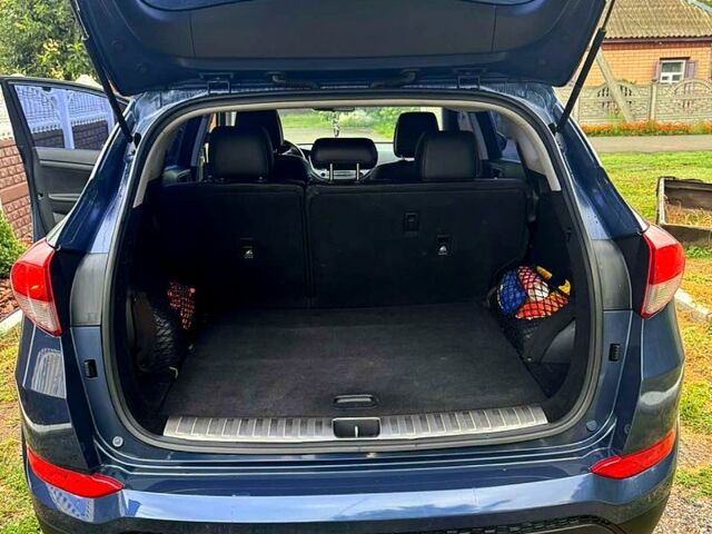 Синій Хендай Туксон, об'ємом двигуна 2 л та пробігом 86 тис. км за 18500 $, фото 13 на Automoto.ua