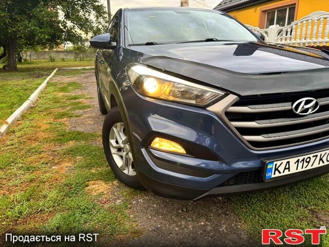 Синій Хендай Туксон, об'ємом двигуна 2 л та пробігом 86 тис. км за 18500 $, фото 3 на Automoto.ua