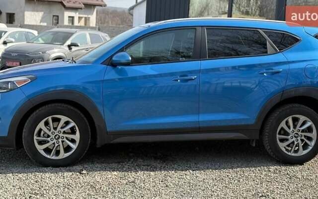 Синій Хендай Туксон, об'ємом двигуна 2 л та пробігом 239 тис. км за 13500 $, фото 7 на Automoto.ua