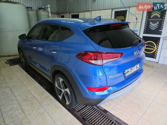 Синий Хендай Туксон, объемом двигателя 1.59 л и пробегом 136 тыс. км за 14300 $, фото 3 на Automoto.ua