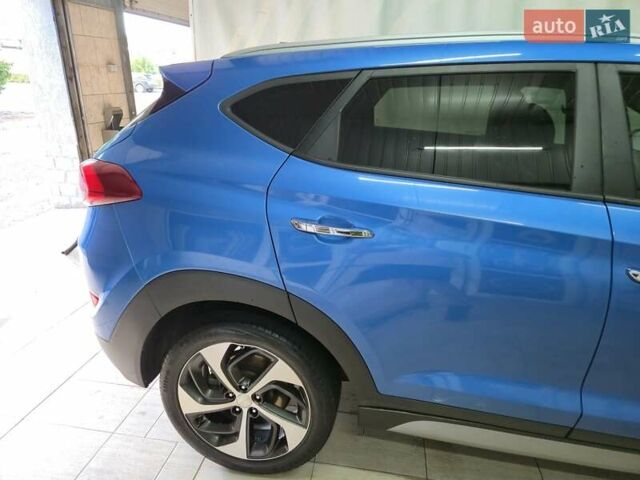 Синий Хендай Туксон, объемом двигателя 1.59 л и пробегом 125 тыс. км за 14800 $, фото 6 на Automoto.ua