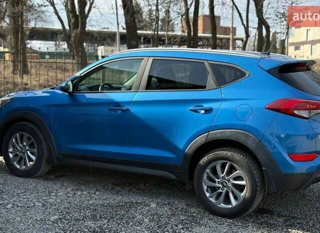 Синій Хендай Туксон, об'ємом двигуна 2 л та пробігом 239 тис. км за 13500 $, фото 9 на Automoto.ua