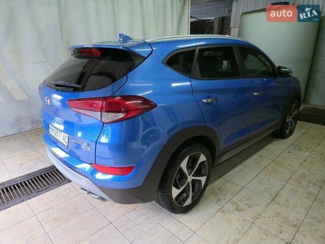 Синий Хендай Туксон, объемом двигателя 1.59 л и пробегом 125 тыс. км за 14800 $, фото 7 на Automoto.ua