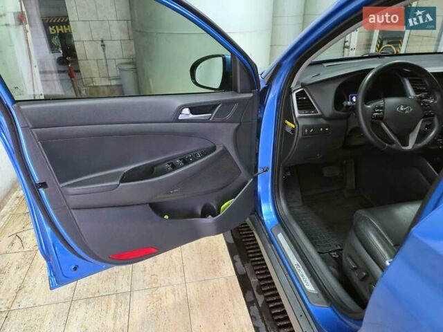 Синий Хендай Туксон, объемом двигателя 1.59 л и пробегом 125 тыс. км за 14800 $, фото 11 на Automoto.ua