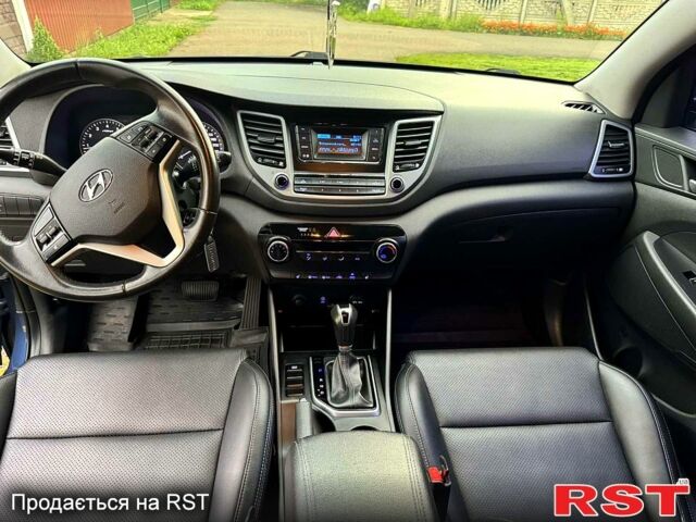 Синій Хендай Туксон, об'ємом двигуна 2 л та пробігом 86 тис. км за 18500 $, фото 8 на Automoto.ua