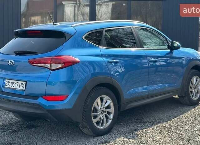 Синій Хендай Туксон, об'ємом двигуна 2 л та пробігом 239 тис. км за 13500 $, фото 1 на Automoto.ua
